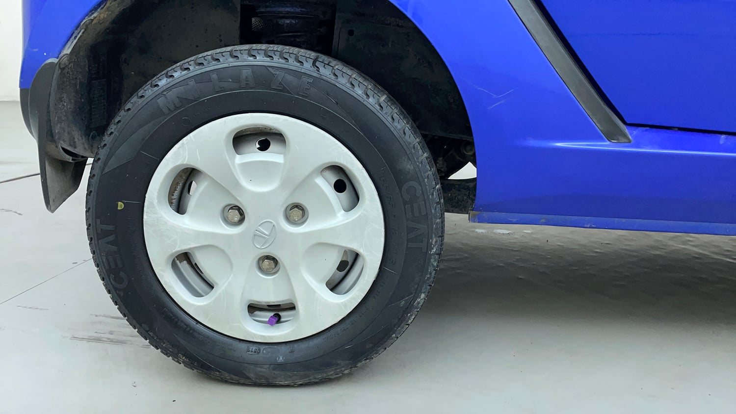 Used 2014 Tata Nano Twist XT Petrol Manual tyres RIGHT REAR TYRE RIM VIEW