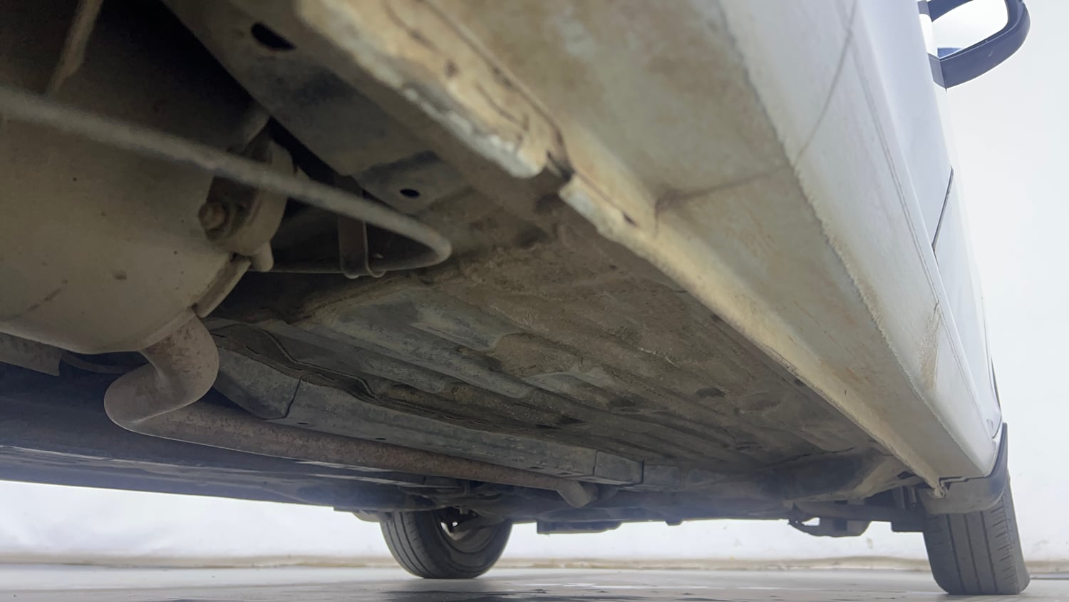 Used 2020 Honda Amaze 1.2 VX MT Petrol Petrol Manual extra REAR RIGHT UNDERBODY VIEW