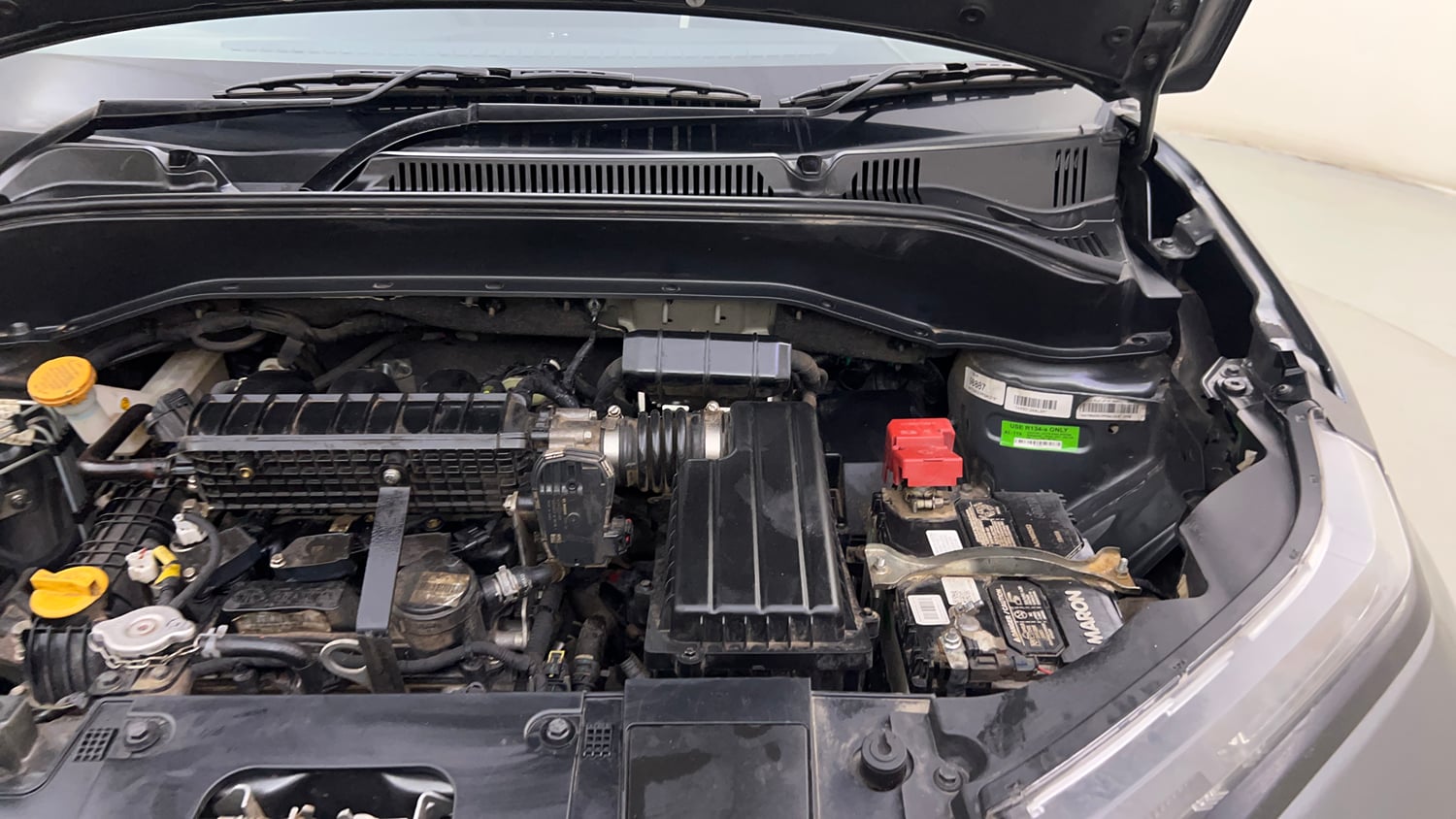 Used 2023 Tata Punch Pure MT Petrol Manual engine ENGINE LEFT SIDE HINGE & APRON VIEW