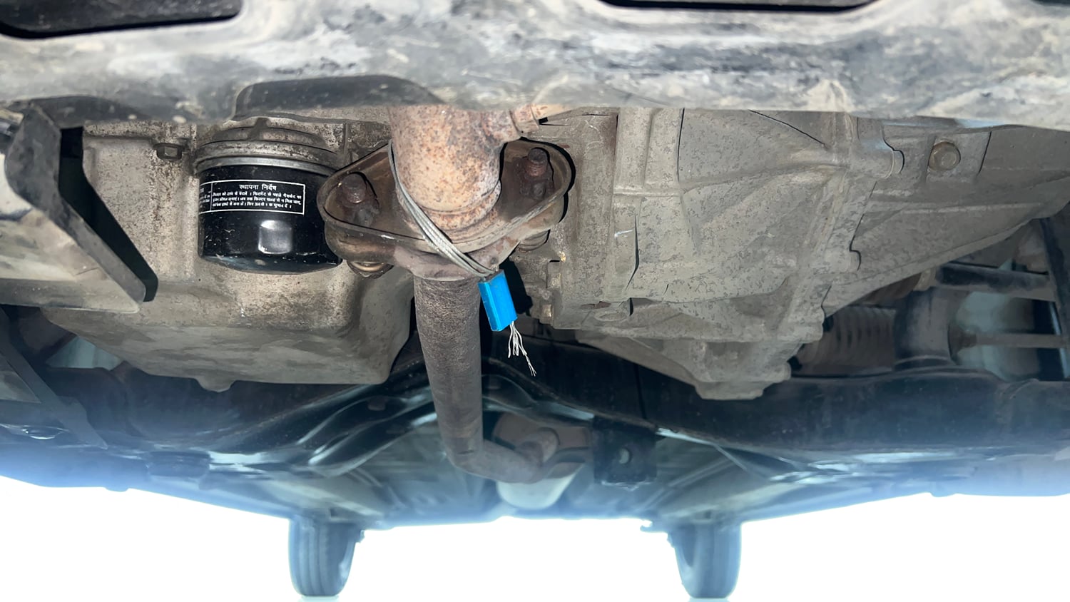 Used 2015 Maruti Suzuki Celerio VXi AMT Petrol Automatic extra FRONT LEFT UNDERBODY VIEW