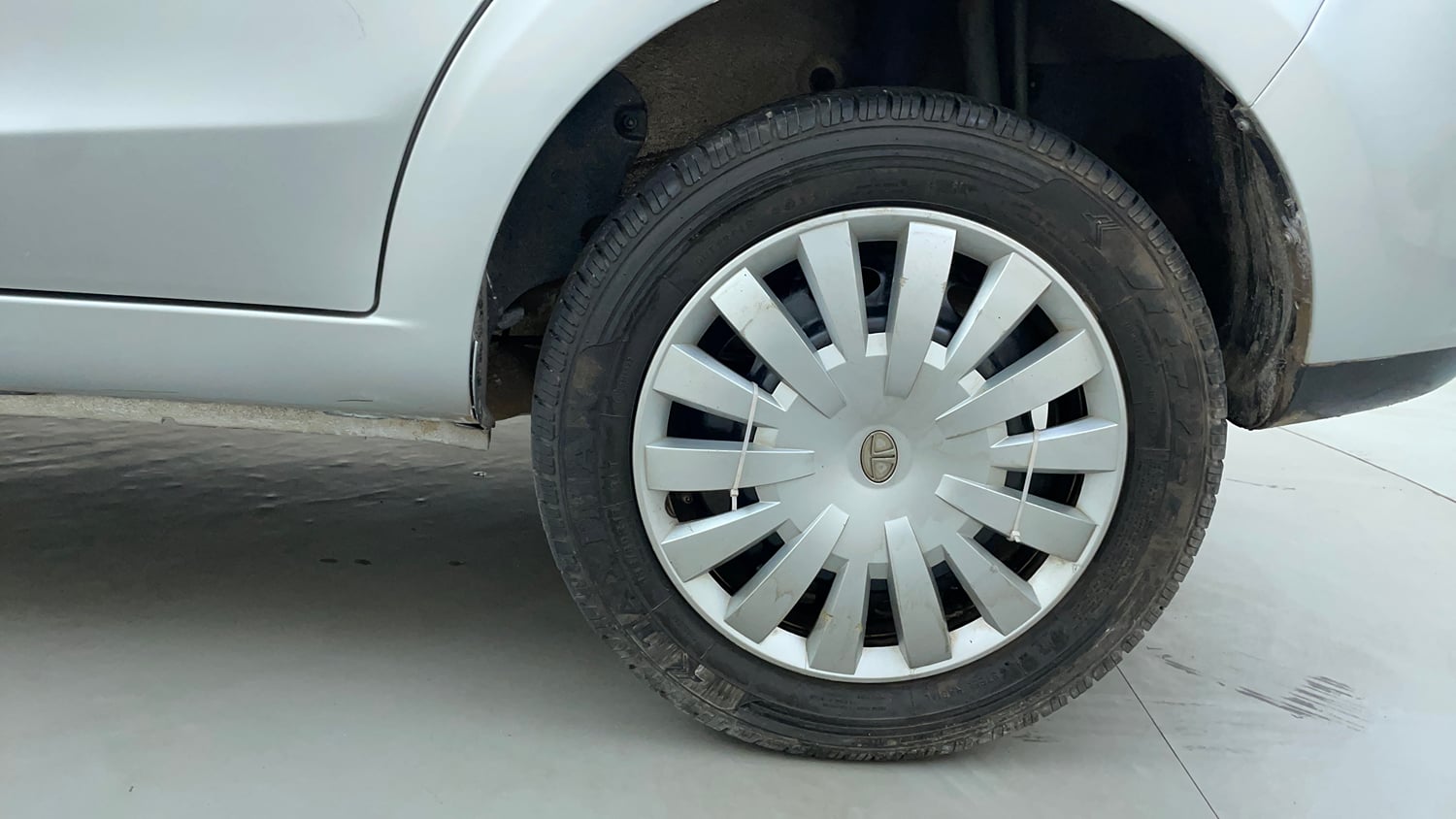 Used 2015 Tata Zest XM Petrol Petrol Manual tyres LEFT REAR TYRE RIM VIEW