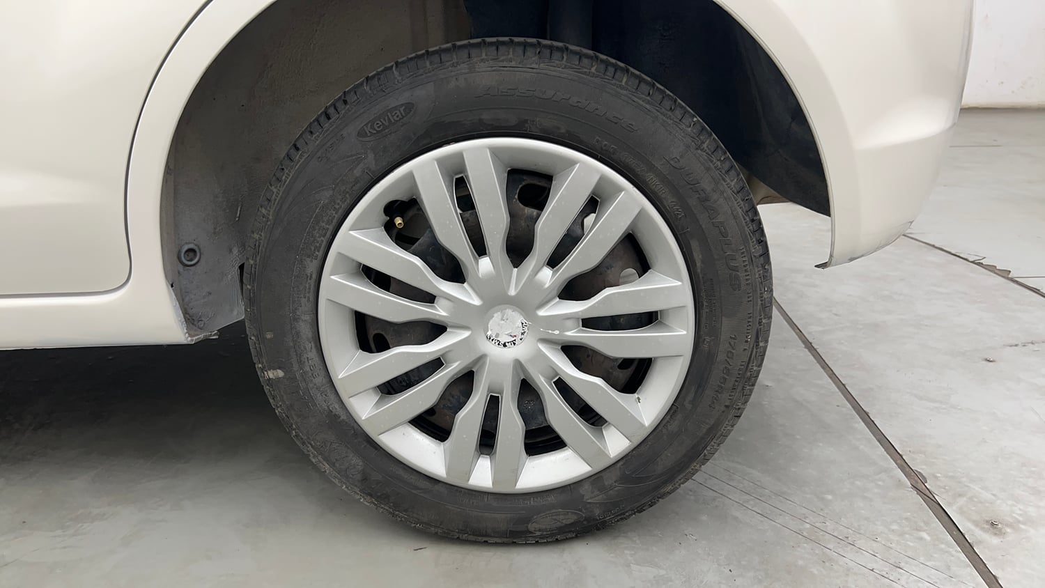 Used 2014 Ford Figo Duratec Petrol ZXI 1.2 Petrol Manual tyres LEFT REAR TYRE RIM VIEW