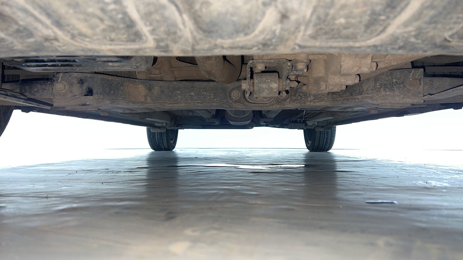 Used 2021 Hyundai New i20 Asta (O) 1.0 Turbo DCT Petrol Automatic extra FRONT LEFT UNDERBODY VIEW