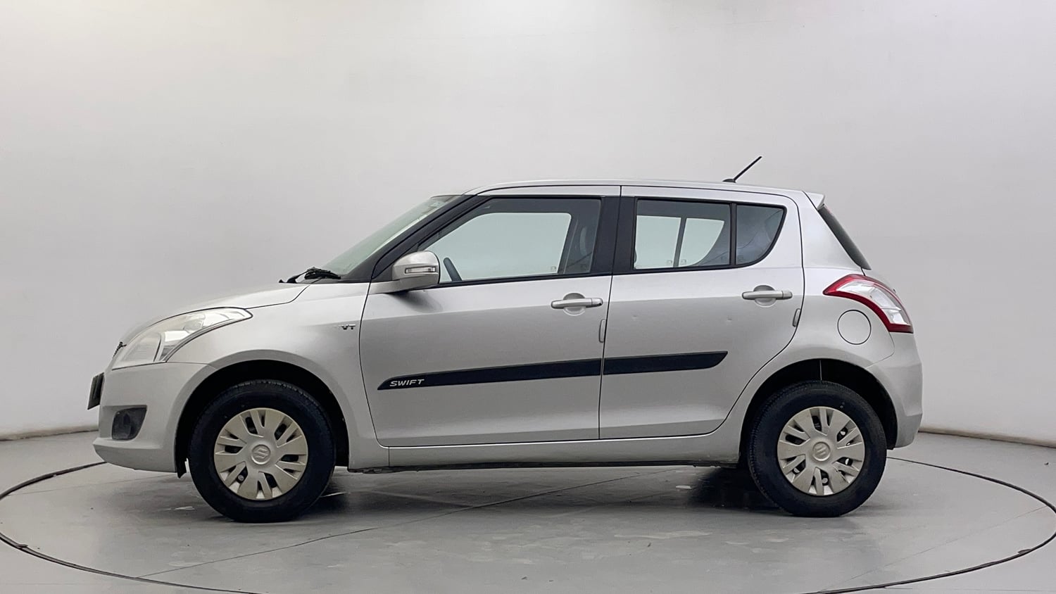 Used 2014 Maruti Suzuki Swift VXi Petrol Manual exterior LEFT SIDE VIEW