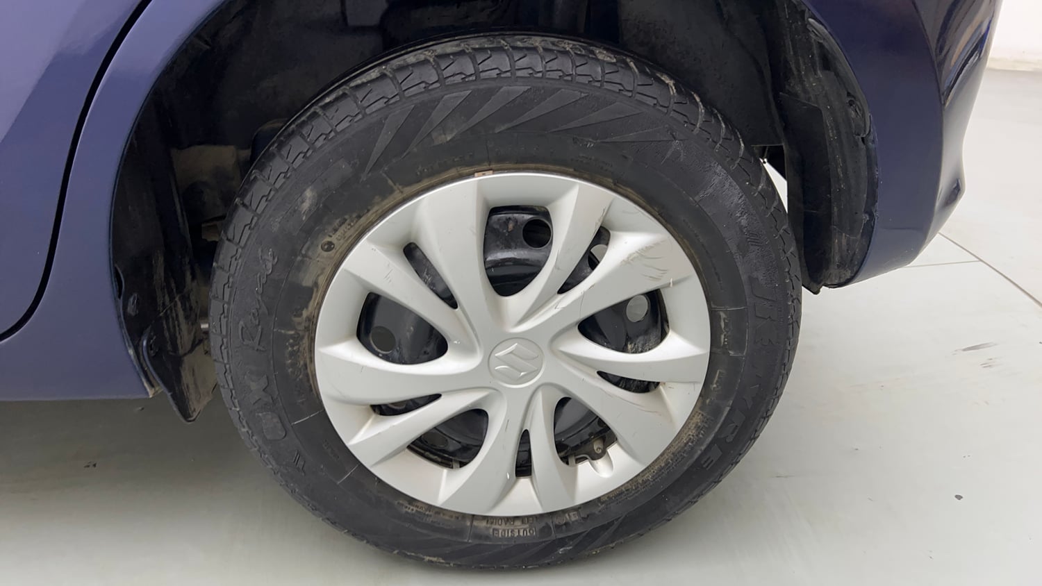 Used 2022 Maruti Suzuki Swift VXi Petrol Manual tyres LEFT REAR TYRE RIM VIEW