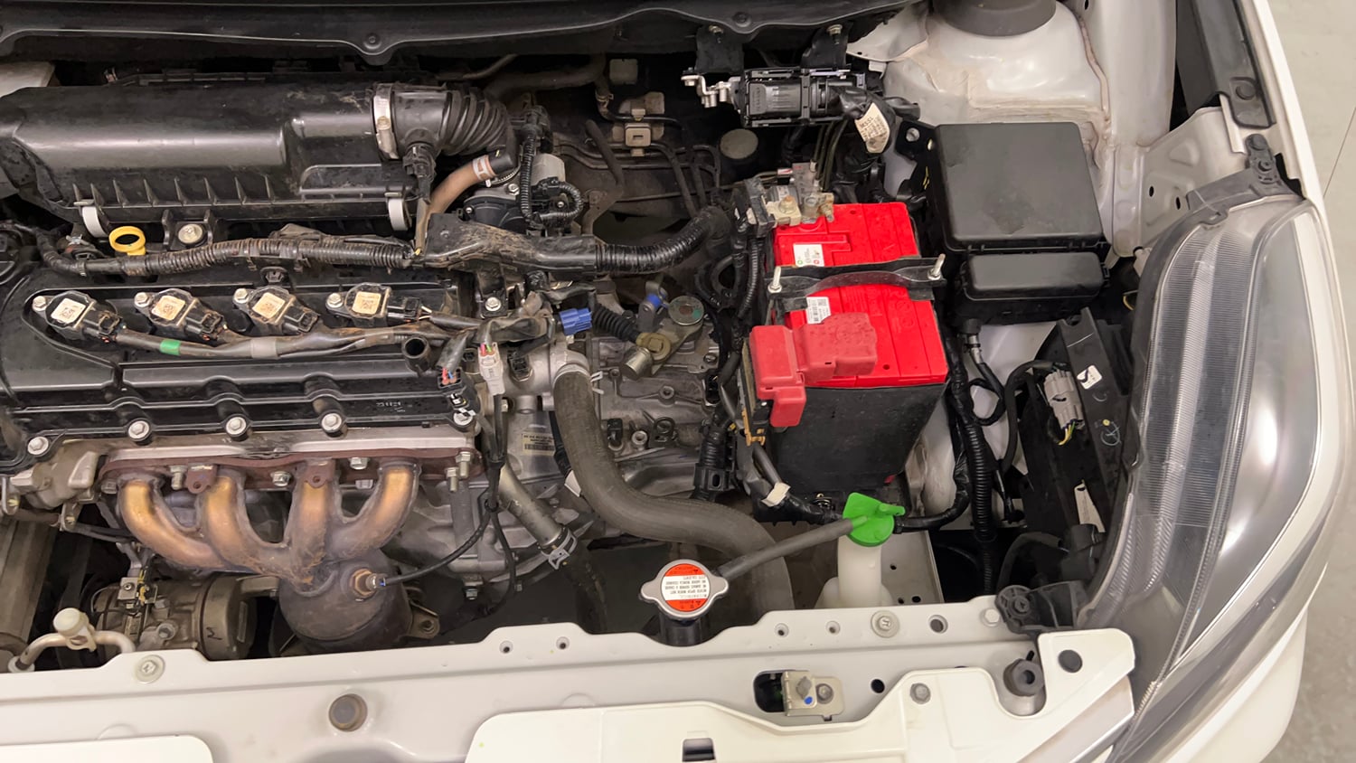 Used 2021 Toyota Glanza G Petrol Manual engine ENGINE LEFT SIDE VIEW