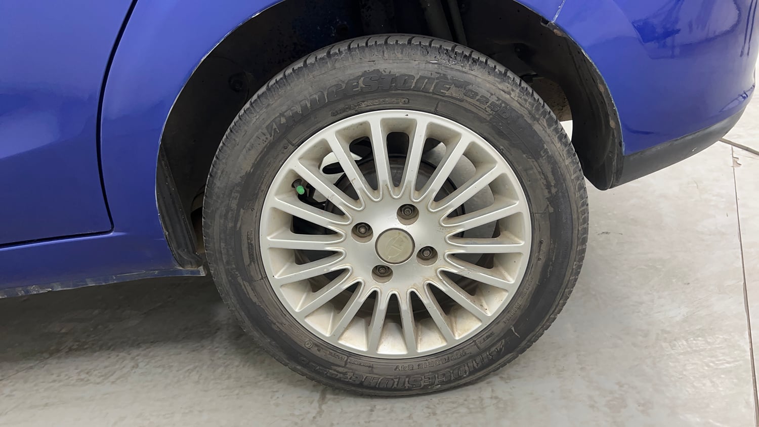 Used 2014 Tata Zest XM Petrol Petrol Manual tyres LEFT REAR TYRE RIM VIEW