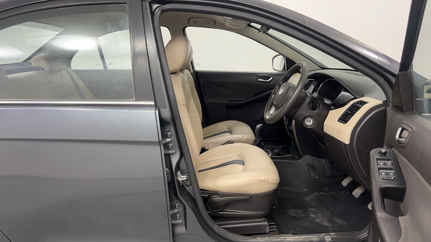 Used 2016 Tata Zest XT Petrol Petrol Manual interior RIGHT SIDE FRONT DOOR CABIN VIEW