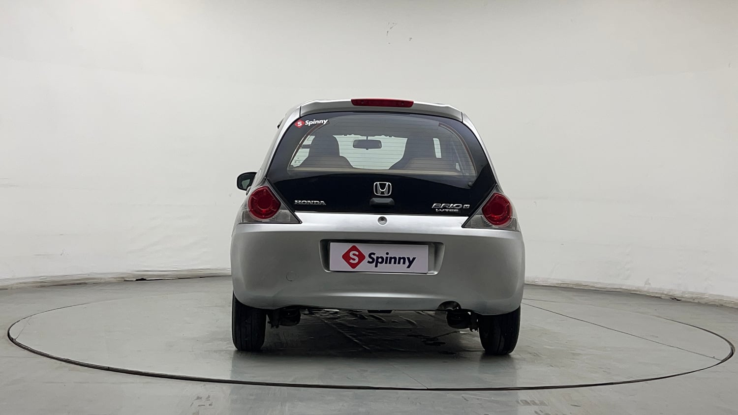 Used 2013 Honda Brio V MT Petrol Manual exterior BACK VIEW