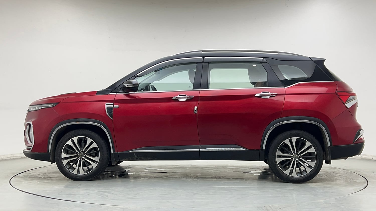 Used 2021 MG Motors Hector Plus Sharp 1.5 Petrol Turbo CVT 6-STR Dual Tone Petrol Automatic exterior LEFT SIDE VIEW