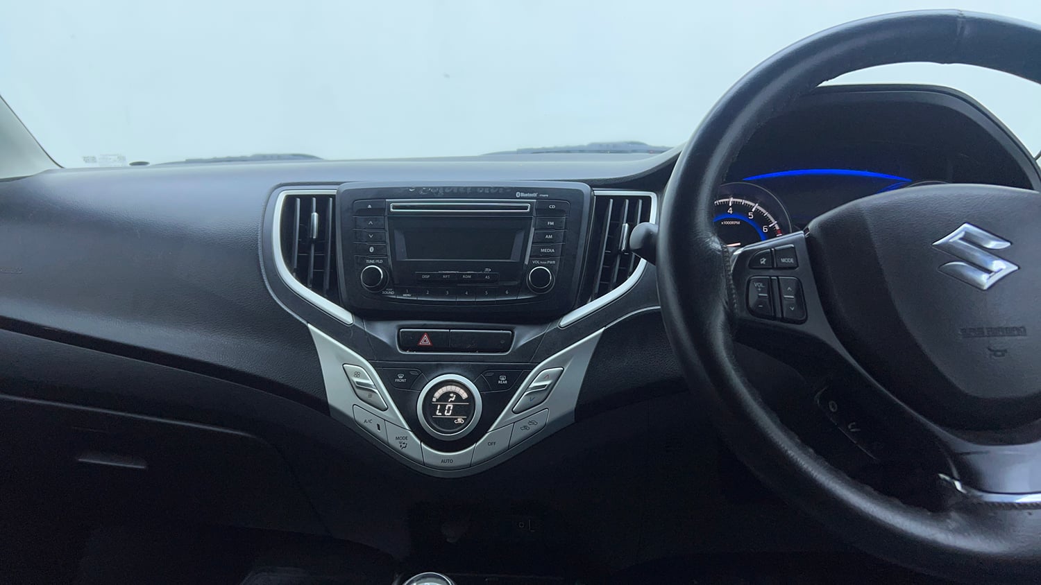 Used 2018 Maruti Suzuki Baleno Delta 1.2 Petrol Manual top_features Integrated (in-dash) music system