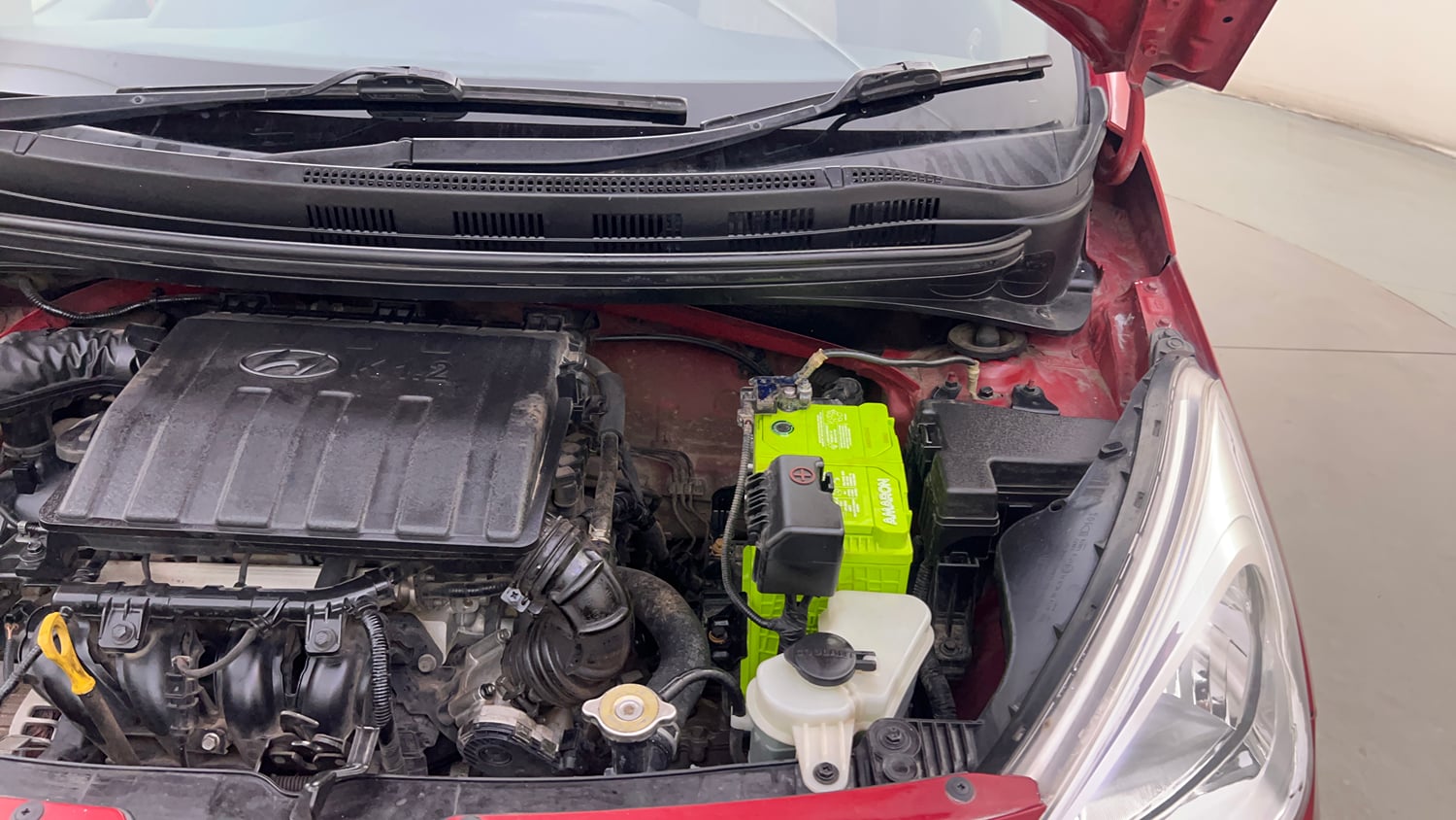 Used 2018 Hyundai Grand i10 Sportz (O) 1.2 Kappa VTVT Petrol Manual engine ENGINE LEFT SIDE HINGE & APRON VIEW
