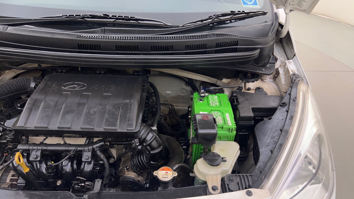 Used 2014 Hyundai Grand i10 Sportz 1.2 Kappa VTVT Petrol Manual engine ENGINE LEFT SIDE HINGE & APRON VIEW