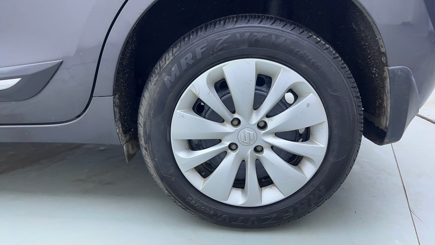 Used 2018 Maruti Suzuki Baleno Delta 1.2 Petrol Manual tyres LEFT REAR TYRE RIM VIEW