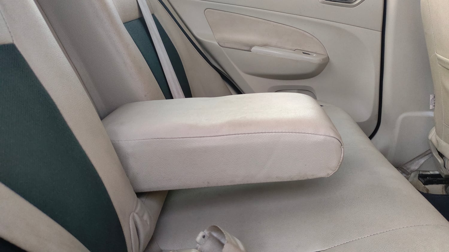 Used 2015 Maruti Suzuki Swift Dzire VXI Petrol Manual top_features Rear seat centre arm rest