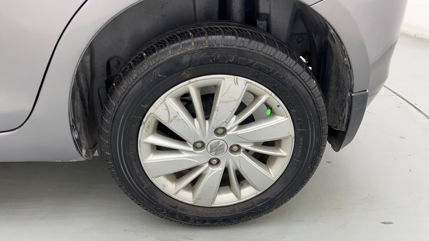 Used 2015 Maruti Suzuki Swift ZXi Petrol Manual tyres LEFT REAR TYRE RIM VIEW