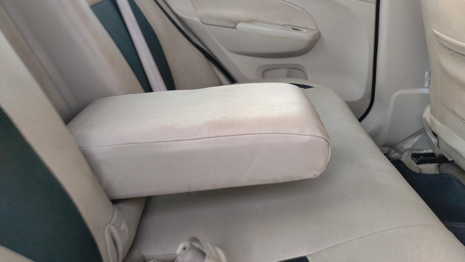 Used 2015 Maruti Suzuki Swift Dzire VXI Petrol Manual top_features Folding table in the rear