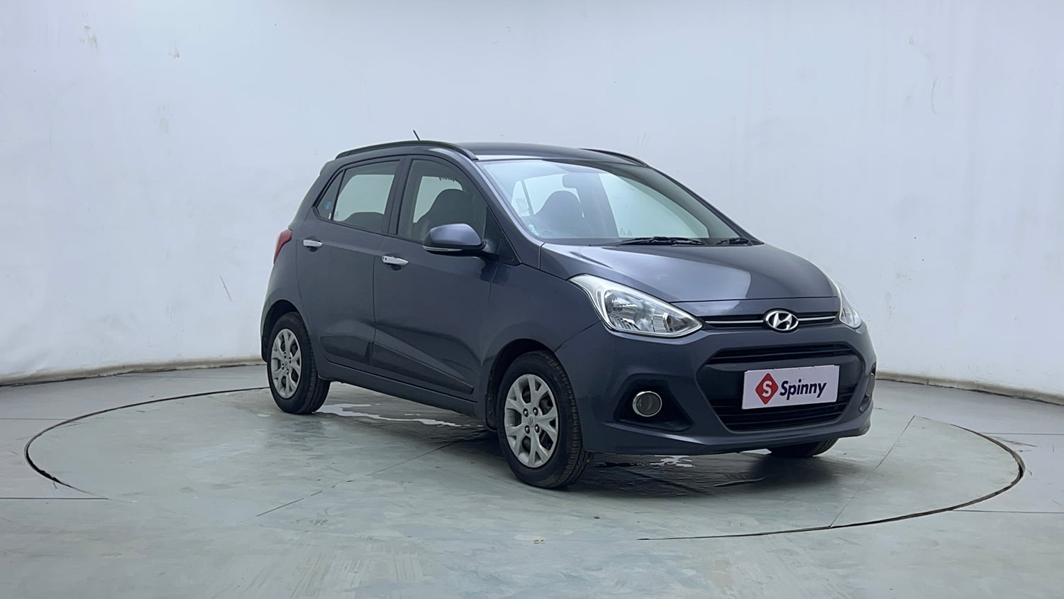 Used 2014 Hyundai Grand i10 Sportz AT 1.2 Kappa VTVT Petrol Automatic exterior RIGHT FRONT CORNER VIEW