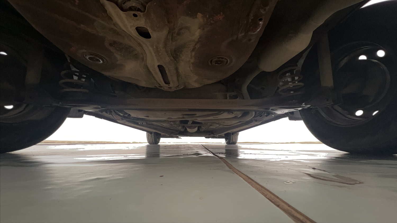 Used 2021 Maruti Suzuki Swift LXi Petrol Manual extra REAR UNDERBODY VIEW (TAKEN FROM REAR)