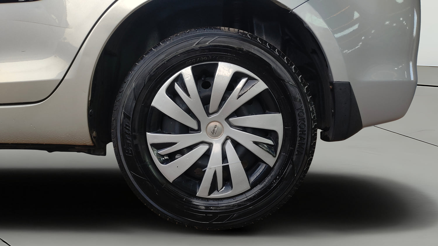 Used 2015 Maruti Suzuki Swift Dzire VXI Petrol Manual tyres LEFT REAR TYRE RIM VIEW