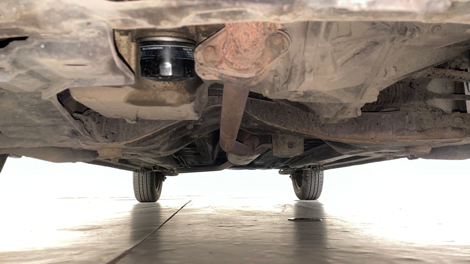 Used 2016 Maruti Suzuki Celerio ZXi AMT Petrol Automatic extra FRONT LEFT UNDERBODY VIEW