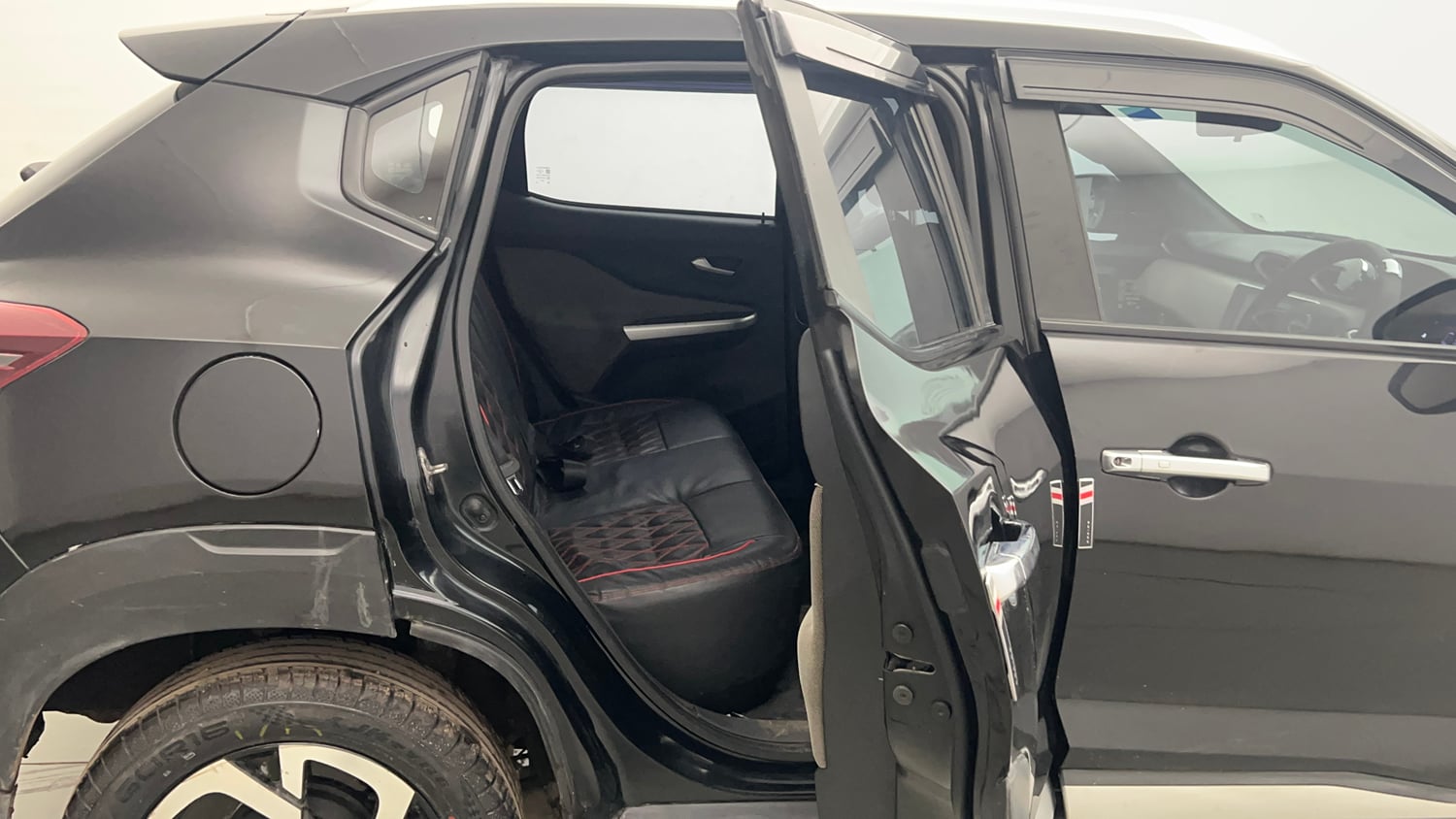 Used 2023 Nissan Magnite XV Petrol Manual interior RIGHT SIDE REAR DOOR CABIN VIEW