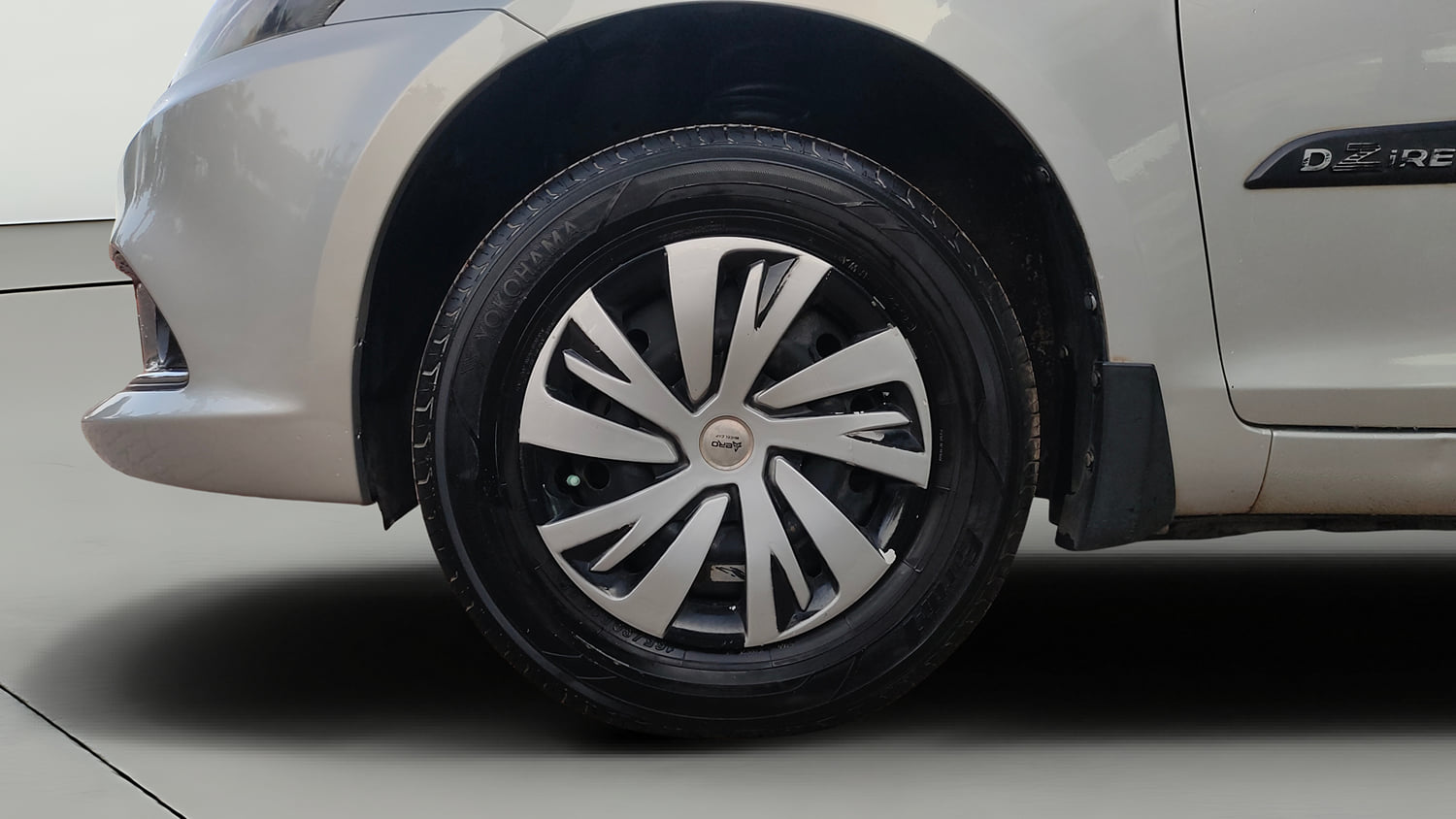 Used 2015 Maruti Suzuki Swift Dzire VXI Petrol Manual tyres LEFT FRONT TYRE RIM VIEW