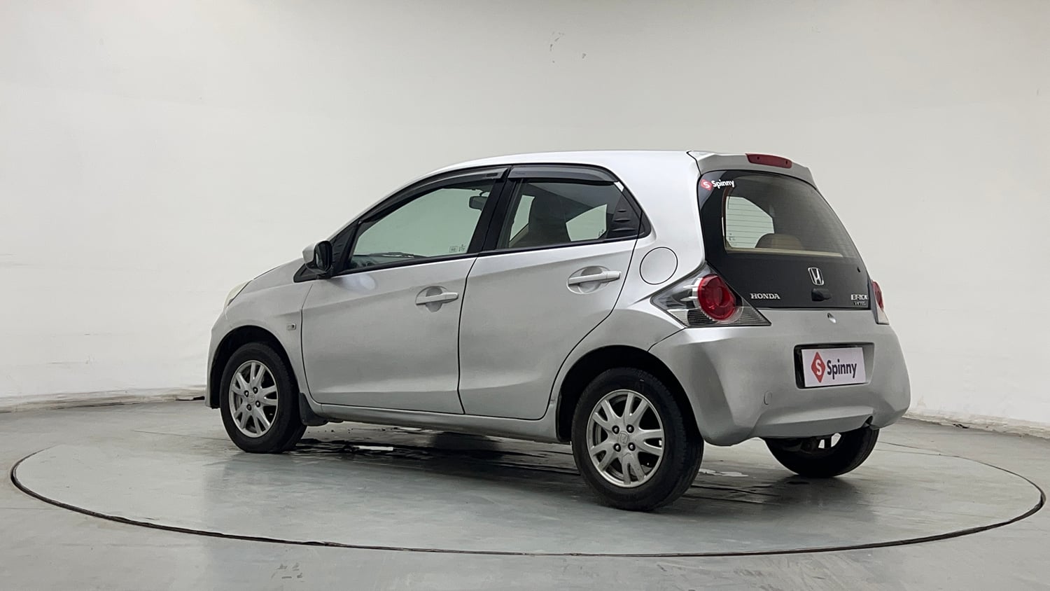 Used 2013 Honda Brio V MT Petrol Manual exterior LEFT REAR CORNER VIEW