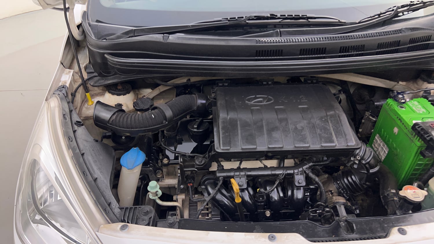 Used 2014 Hyundai Grand i10 Sportz 1.2 Kappa VTVT Petrol Manual engine ENGINE RIGHT SIDE HINGE & APRON VIEW