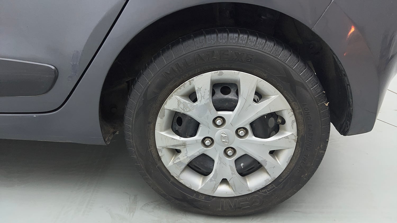 Used 2016 Hyundai Grand i10 Sportz 1.2 Kappa VTVT Petrol Manual tyres LEFT REAR TYRE RIM VIEW