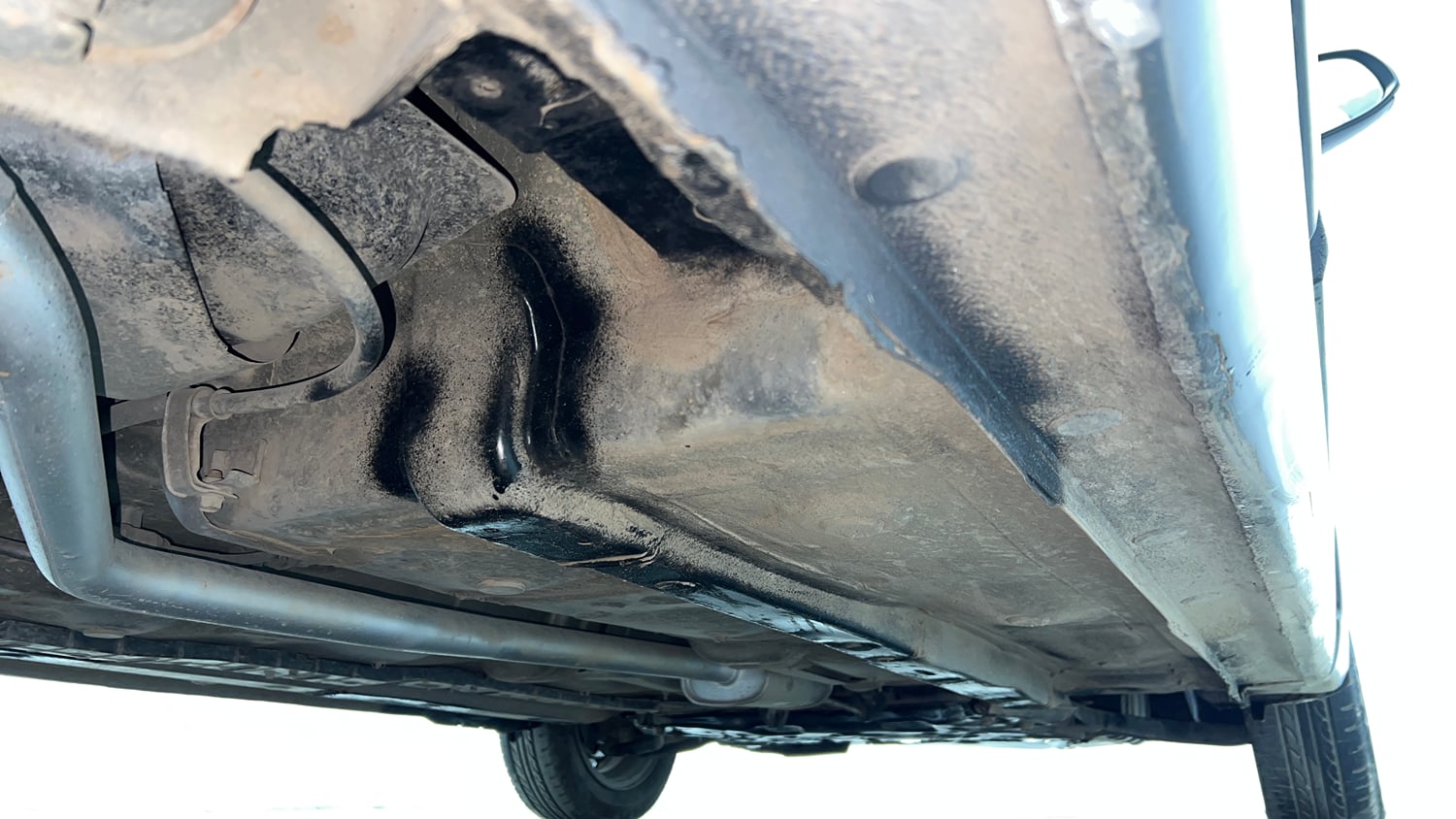 Used 2017 Hyundai Grand i10 Sportz (O) AT 1.2 Kappa VTVT Petrol Automatic extra REAR RIGHT UNDERBODY VIEW