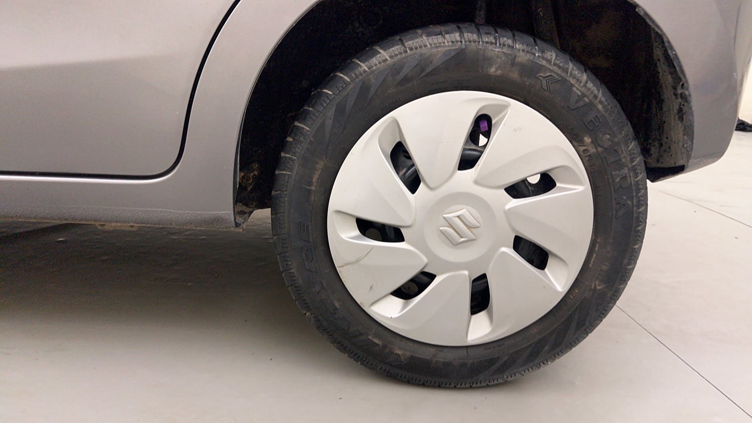 Used 2014 Maruti Suzuki Celerio VXi Petrol Manual tyres LEFT REAR TYRE RIM VIEW