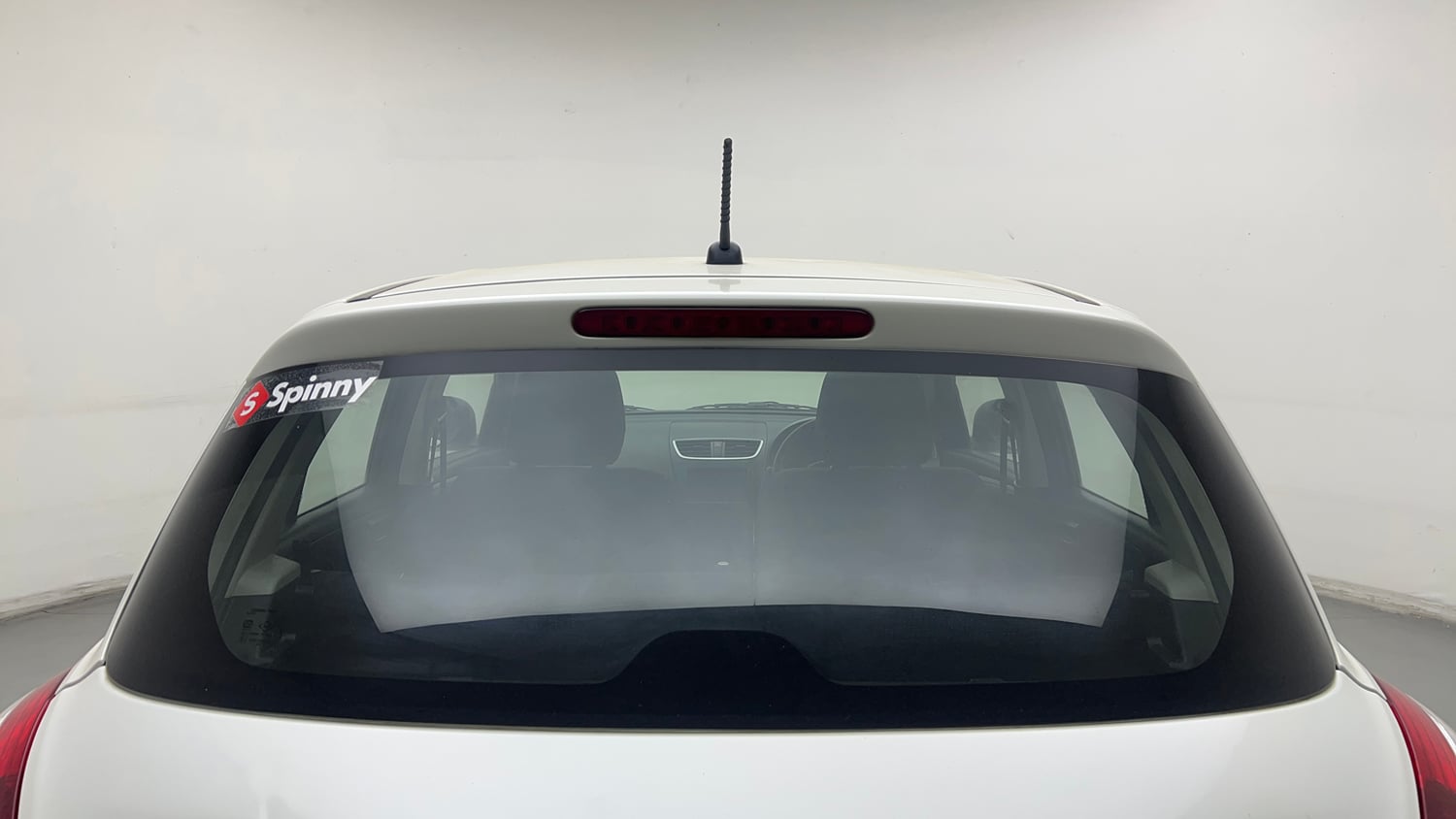 Used 2016 Maruti Suzuki Swift Lxi (O) Petrol Manual exterior BACK WINDSHIELD VIEW