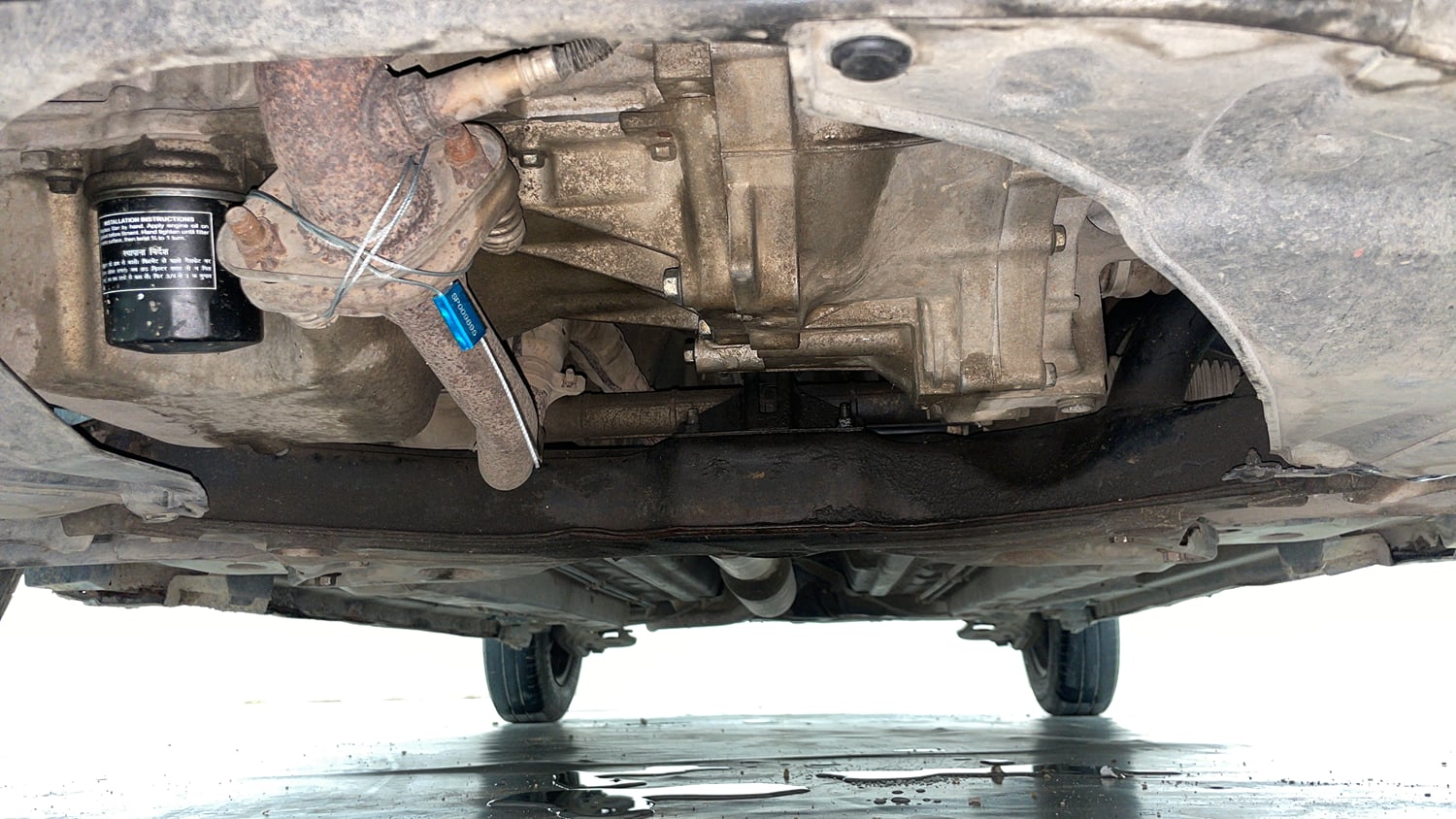 Used 2015 Maruti Suzuki Swift VXi Petrol Manual extra FRONT LEFT UNDERBODY VIEW