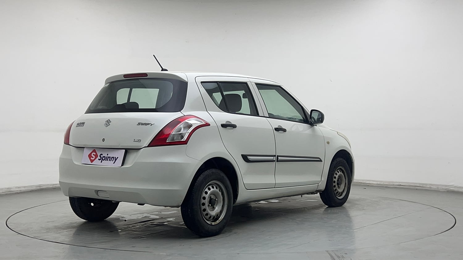 Used 2016 Maruti Suzuki Swift Lxi (O) Petrol Manual exterior RIGHT REAR CORNER VIEW