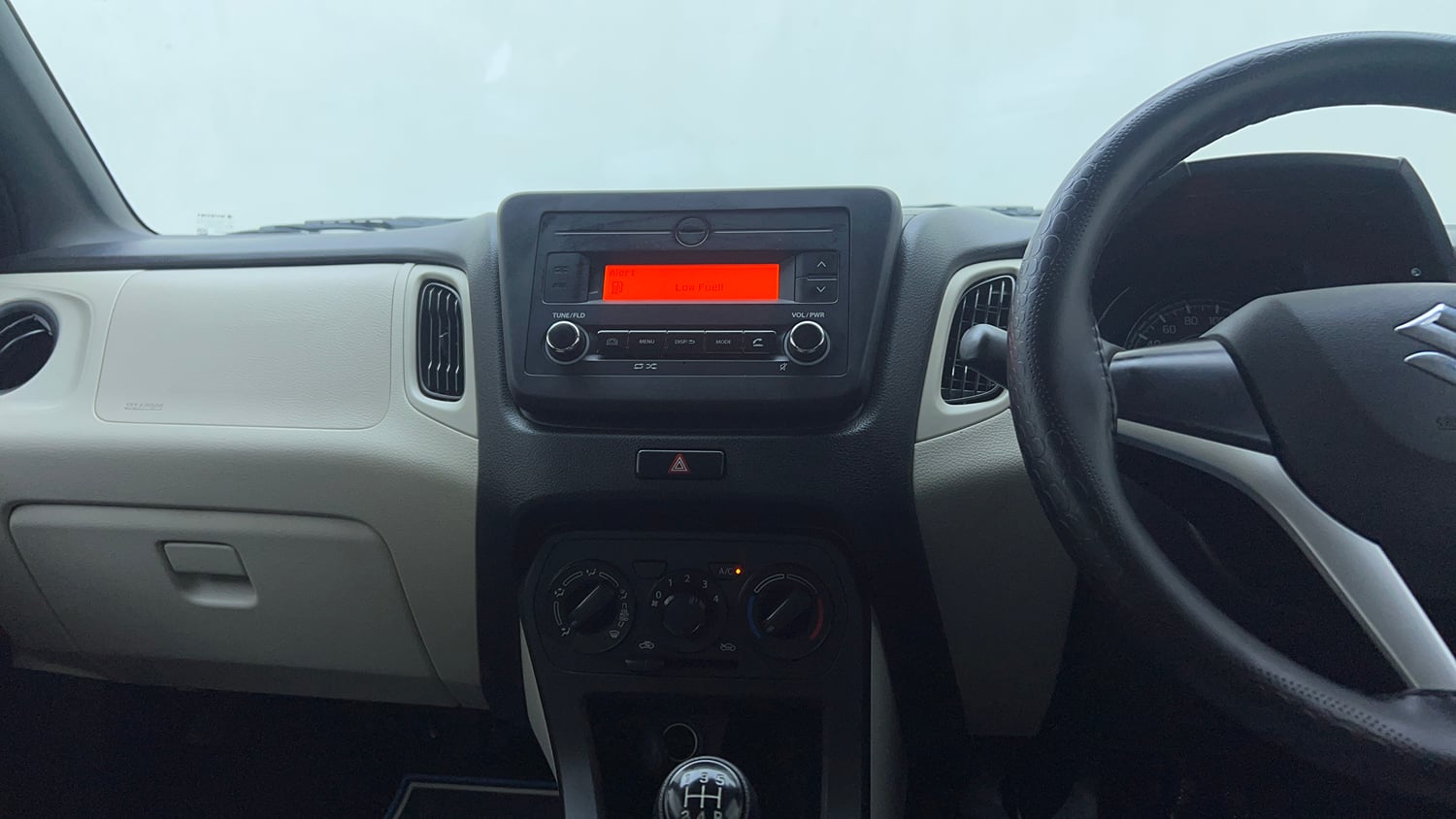 Used 2023 Maruti Suzuki Wagon R VXI 1.0 Petrol Manual top_features Integrated (in-dash) music system