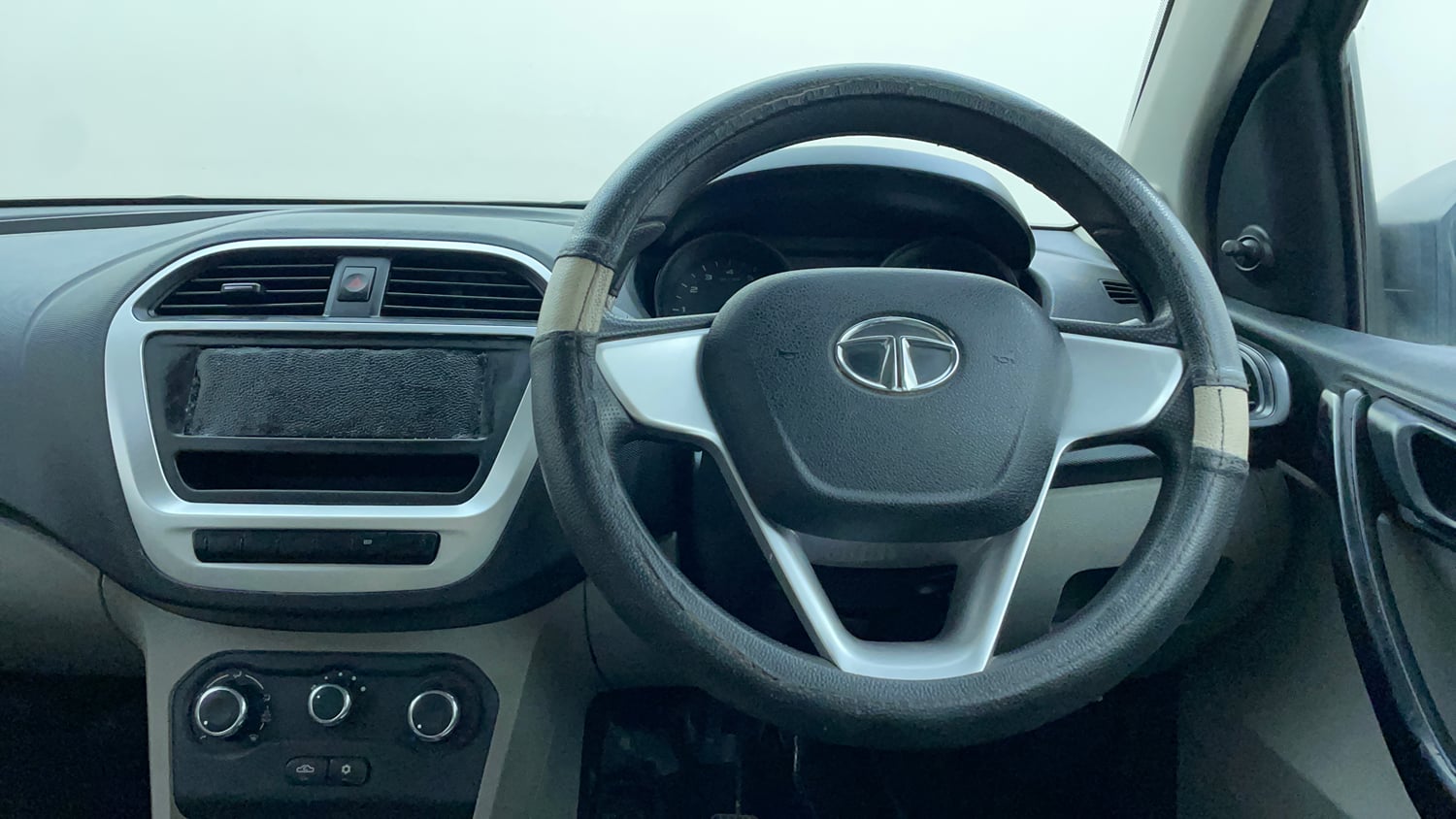 Used 2016 Tata Tiago Revotron XM Petrol Manual interior STEERING VIEW