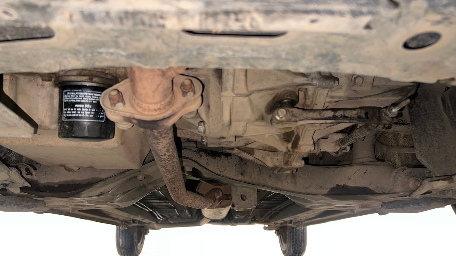 Used 2014 Maruti Suzuki Celerio VXi Petrol Manual extra FRONT LEFT UNDERBODY VIEW