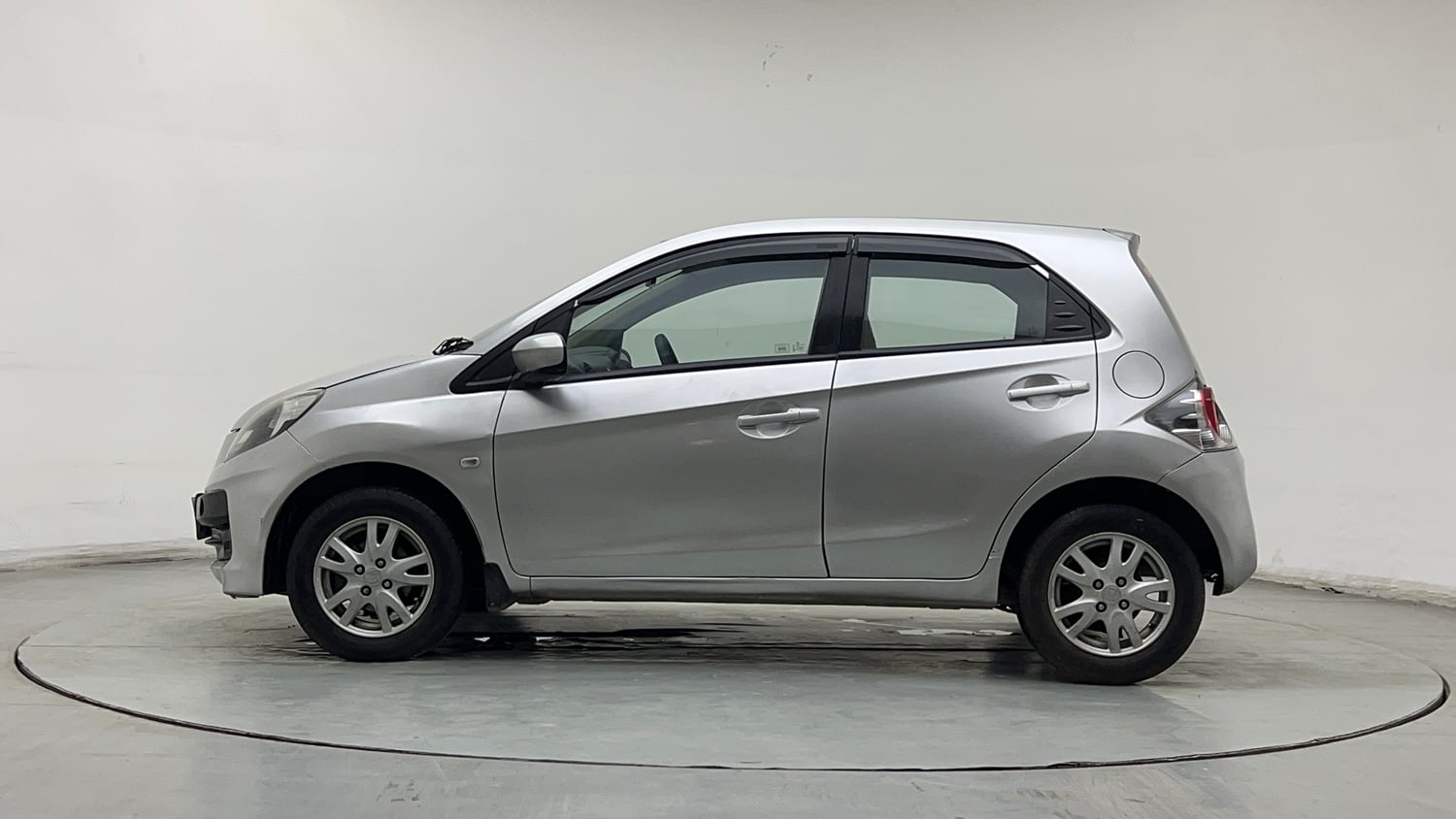 Used 2013 Honda Brio V MT Petrol Manual exterior LEFT SIDE VIEW