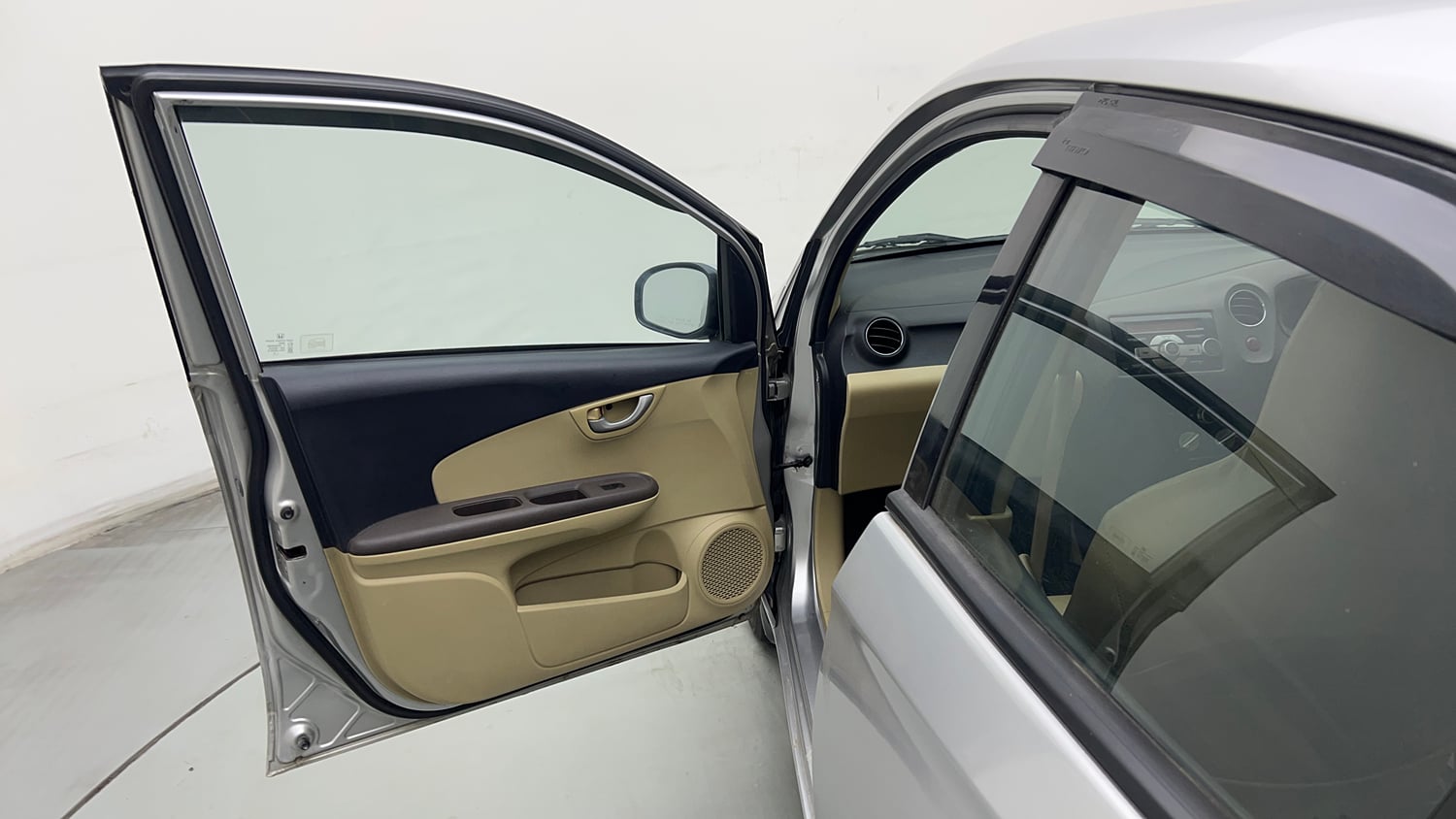 Used 2013 Honda Brio V MT Petrol Manual interior LEFT FRONT DOOR OPEN VIEW