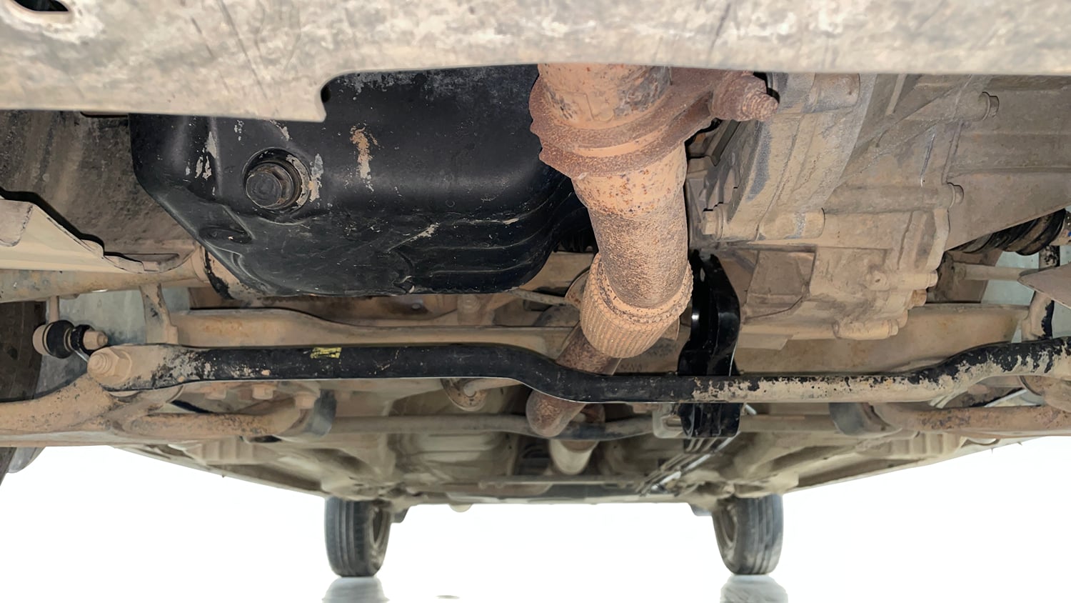 Used 2016 Tata Tiago Revotron XM Petrol Manual extra FRONT LEFT UNDERBODY VIEW