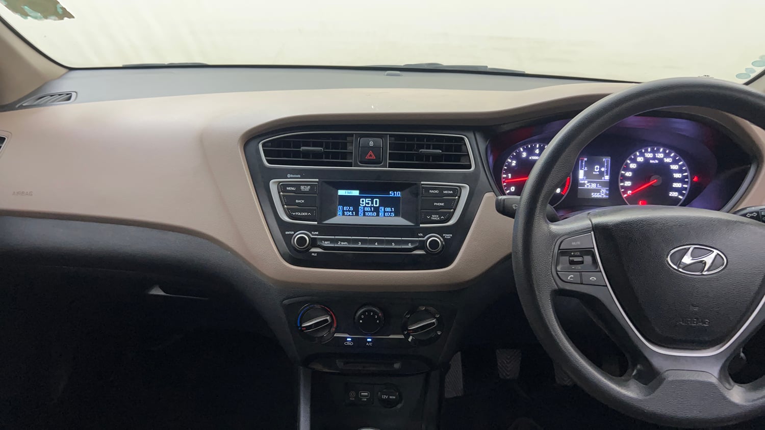 Used 2019 Hyundai Elite i20 Magna Plus 1.2 + CNG (Outside Fitted) Petrol Manual interior MUSIC SYSTEM & AC CONTROL VIEW
