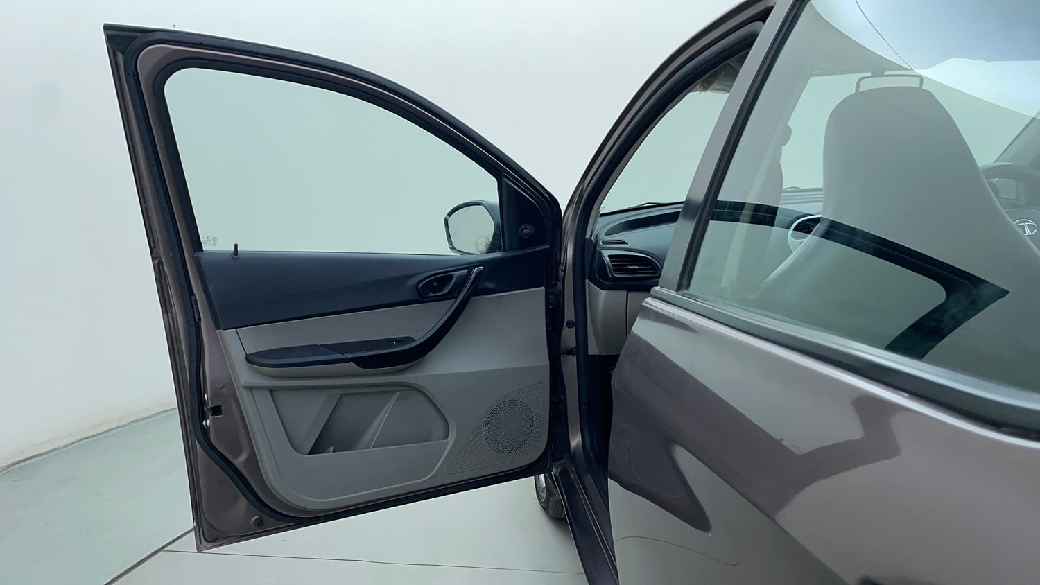 Used 2016 Tata Tiago Revotron XM Petrol Manual interior LEFT FRONT DOOR OPEN VIEW