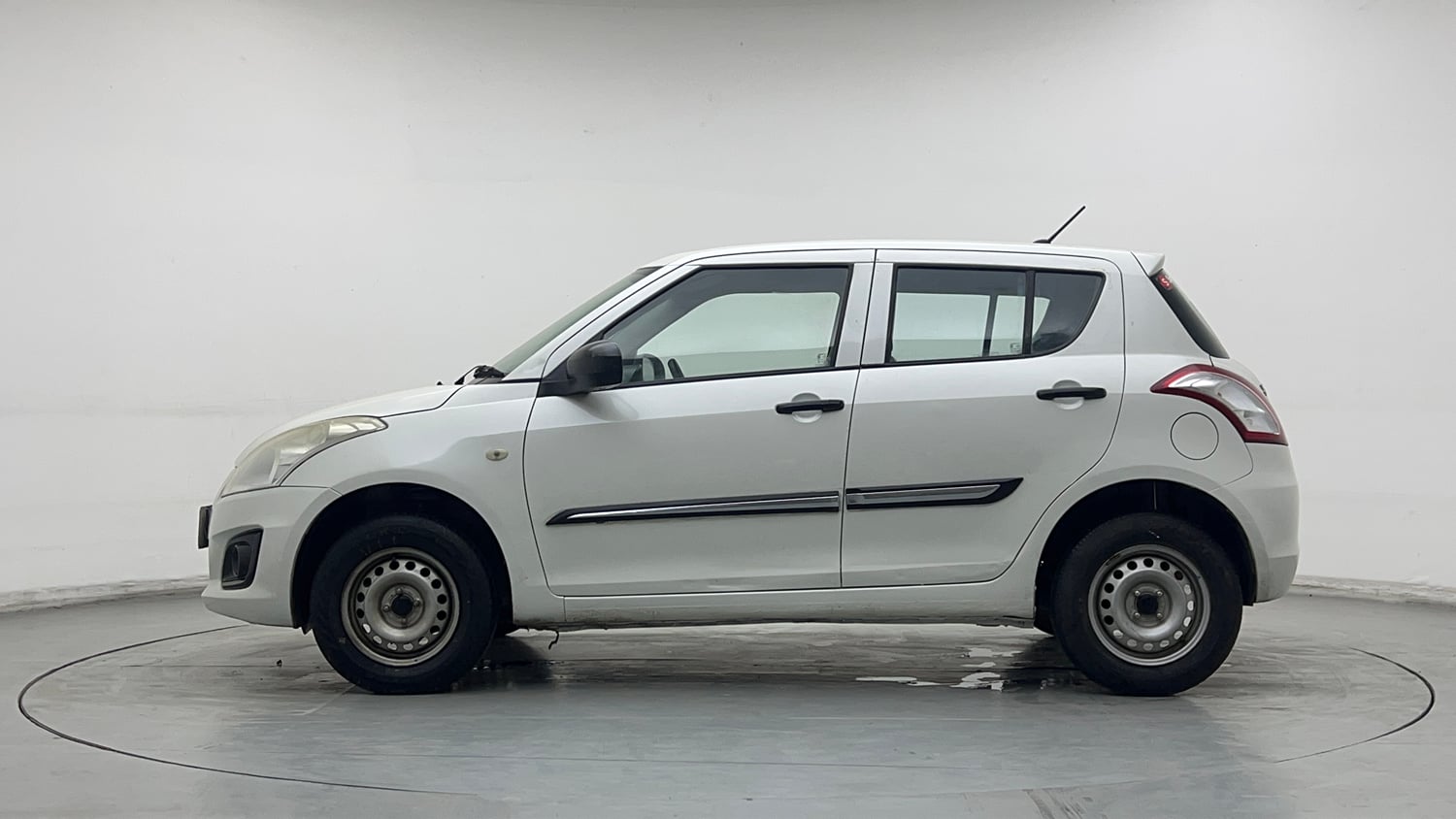 Used 2016 Maruti Suzuki Swift Lxi (O) Petrol Manual exterior LEFT SIDE VIEW