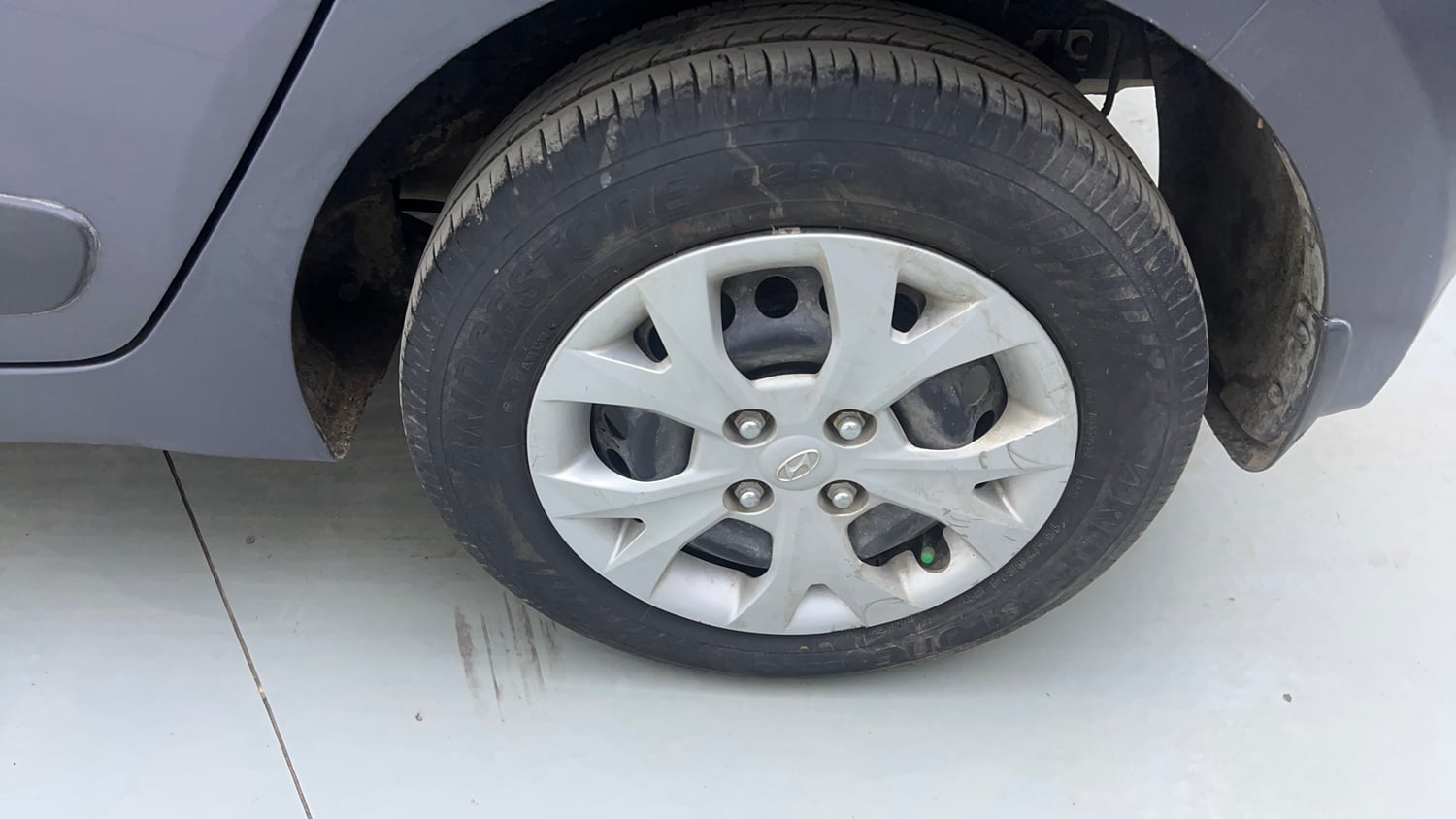Used 2014 Hyundai Grand i10 Sportz AT 1.2 Kappa VTVT Petrol Automatic tyres LEFT REAR TYRE RIM VIEW