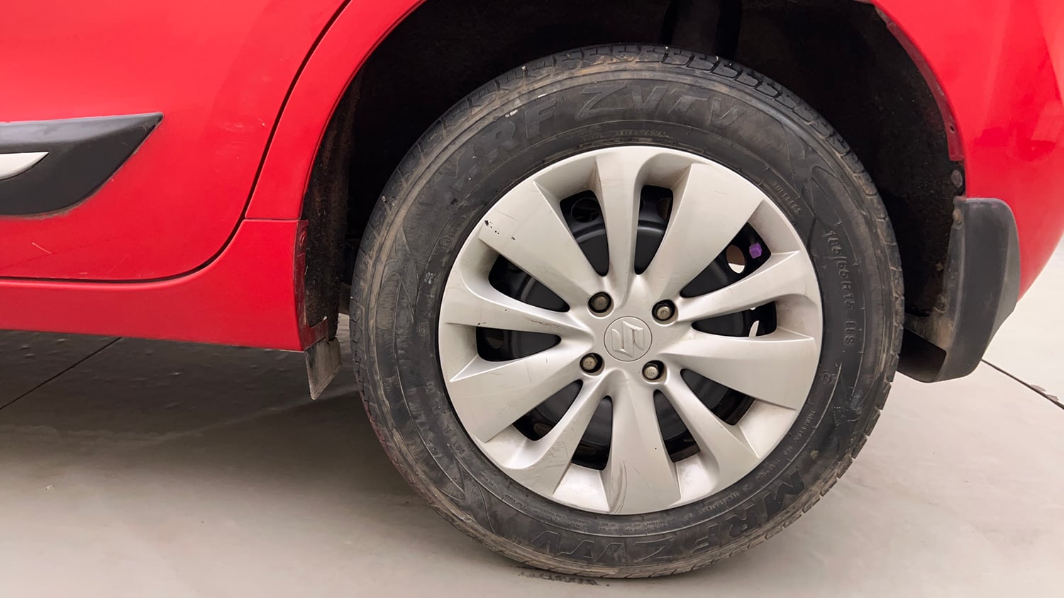 Used 2018 Maruti Suzuki Baleno Delta 1.2 Petrol Manual tyres LEFT REAR TYRE RIM VIEW
