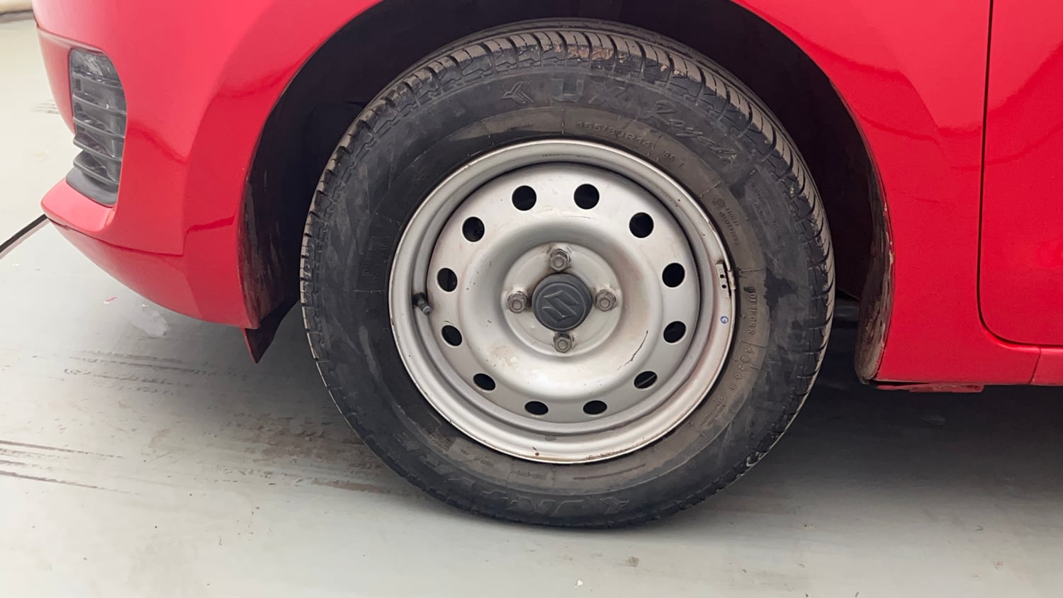 Used 2021 Maruti Suzuki Swift LXi Petrol Manual tyres LEFT FRONT TYRE RIM VIEW