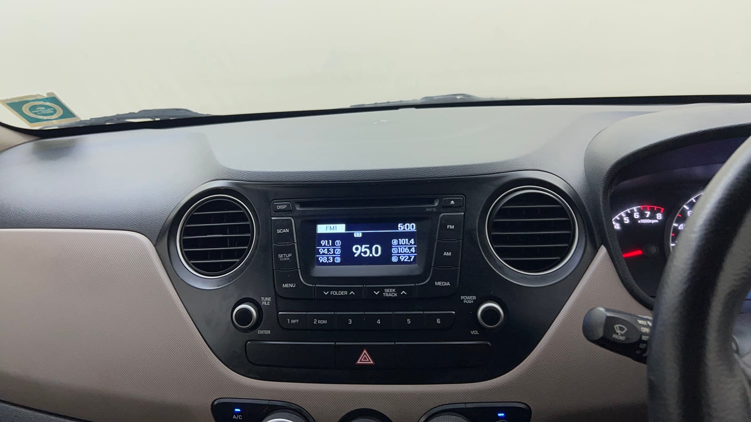 Used 2014 Hyundai Grand i10 Sportz 1.2 Kappa VTVT Petrol Manual top_features Integrated (in-dash) music system