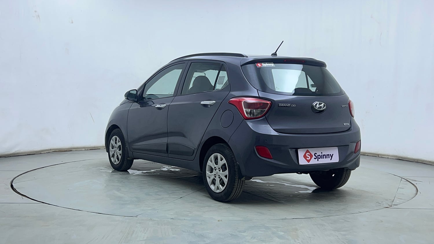 Used 2014 Hyundai Grand i10 Sportz AT 1.2 Kappa VTVT Petrol Automatic exterior LEFT REAR CORNER VIEW