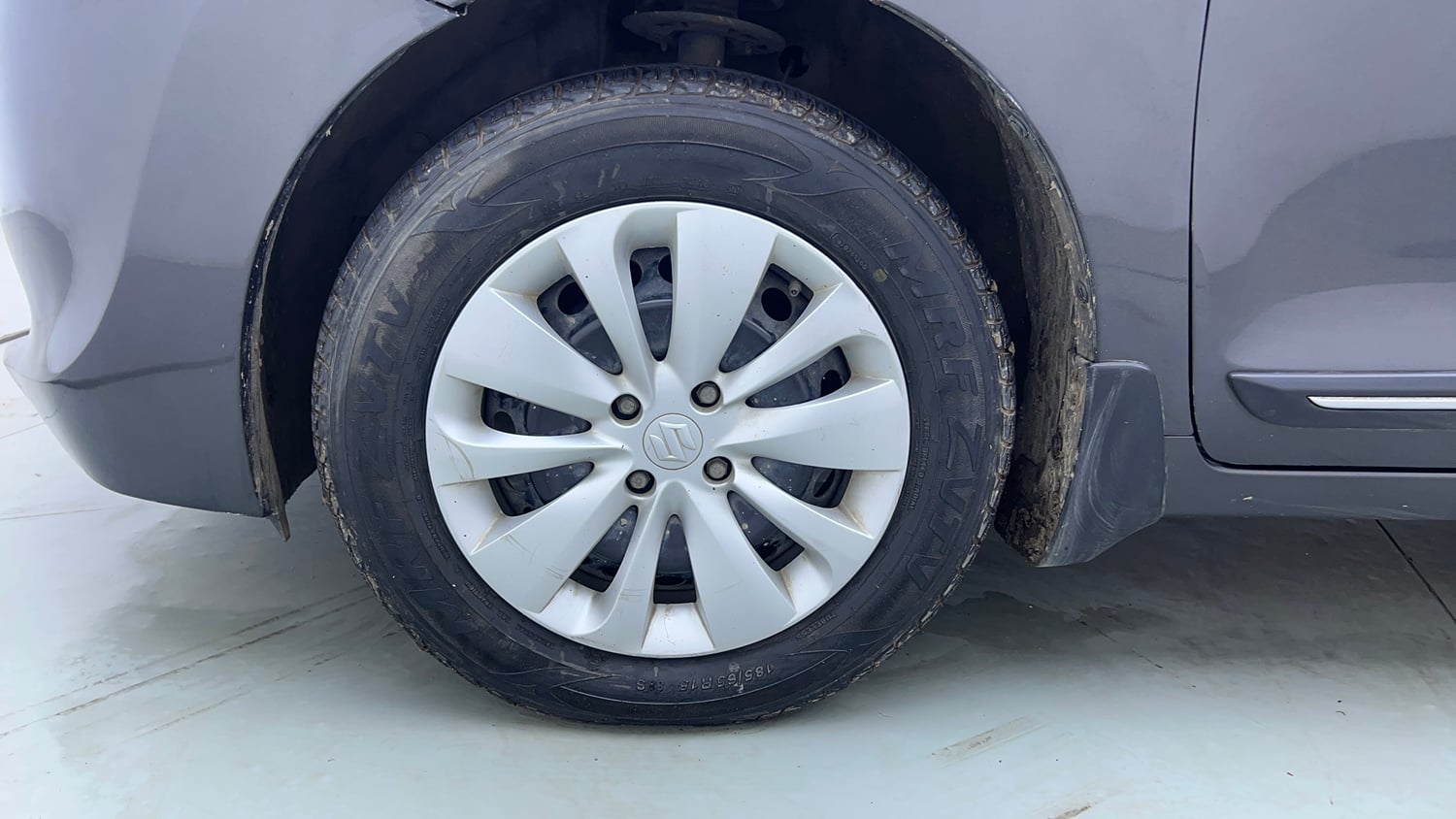 Used 2018 Maruti Suzuki Baleno Delta 1.2 Petrol Manual tyres LEFT FRONT TYRE RIM VIEW